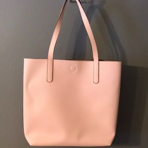 Blush colored hand bag